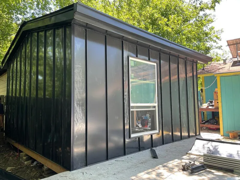 Black standing seam metal wall panels for Roof Inspection in Southfield